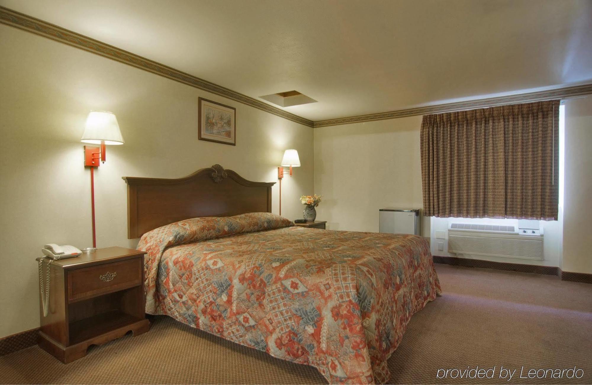Amerivu Inn And Suites Wolcott Room photo